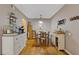 Dining room with wood floors, table, and a bar with coffee maker at 3155 Seven Pines Ct # 303, Atlanta, GA 30339
