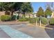 Electric Vehicle Charging Station in a parking area with landscaping at 3155 Seven Pines Ct # 303, Atlanta, GA 30339