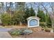 Vinings View Condominiums entrance sign with stone base and landscaping at 3155 Seven Pines Ct # 303, Atlanta, GA 30339