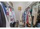 Spacious walk-in closet with custom shelving and storage solutions at 3155 Seven Pines Ct # 303, Atlanta, GA 30339