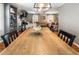 Dining room showcasing a large dining table that joins to the living room at 4062 Silver Fir Ct, Marietta, GA 30066