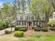 Charming home with driveway, mature trees and landscaped front yard at 4062 Silver Fir Ct, Marietta, GA 30066