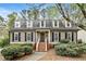 Charming home with a brick walkway, dormer windows and professionally landscaped yard at 4062 Silver Fir Ct, Marietta, GA 30066