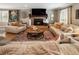Spacious living room featuring a fireplace, neutral decor, and hardwood flooring at 4062 Silver Fir Ct, Marietta, GA 30066