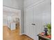 Elegant entryway featuring hardwood floors, and a view into the open kitchen with a large island at 459 James P Brawley Nw Dr, Atlanta, GA 30318