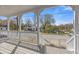 Spacious front porch with white railings offering a view of the street and neighborhood at 459 James P Brawley Nw Dr, Atlanta, GA 30318