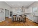 Stylish kitchen with stainless steel appliances, a center island with seating, and ample cabinet space at 459 James P Brawley Nw Dr, Atlanta, GA 30318