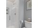 Modern glass shower with white subway tile and decor niche at 459 James P Brawley Nw Dr, Atlanta, GA 30318