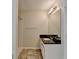 Small bathroom with a shower/tub, vanity, and black countertop at 5880 April Dr, Sugar Hill, GA 30518