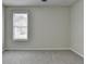 Bedroom with neutral carpet and a bright window at 5880 April Dr, Sugar Hill, GA 30518