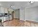 Bright kitchen features stainless steel appliances and white cabinets, blending style and functionality at 5880 April Dr, Sugar Hill, GA 30518