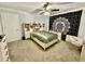 Cozy bedroom with plush carpet, ceiling fan, and decorative mandala tapestry at 1118 Magnolia Se Way, Smyrna, GA 30082