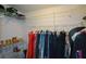 Walk-in closet with shelving for shoes and hanging space for clothes at 1602 Gettysburg Pl, Sandy Springs, GA 30350