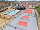 Aerial view of community pool and tennis courts, surrounded by well-maintained landscaping at 262 Royal Crescent Ter, Canton, GA 30115