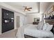 Serene bedroom with a plank accent wall and stylish furnishings at 262 Royal Crescent Ter, Canton, GA 30115