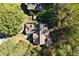 Overhead view of a private home with lush surroundings and mature trees at 591 Briarmeade Sw Dr, Marietta, GA 30064