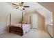 Charming bedroom featuring a four-poster bed and window nook at 591 Briarmeade Sw Dr, Marietta, GA 30064