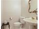 Classic powder room with decorative sink and ornate mirror at 591 Briarmeade Sw Dr, Marietta, GA 30064