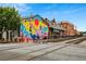 Marietta Welcome Center with railway tracks in front of a colorful mural and brick buildings at 591 Briarmeade Sw Dr, Marietta, GA 30064