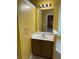 Bathroom featuring a vanity with a white countertop and brown cabinets at 1112 Gather Dr, Lawrenceville, GA 30043