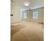 Bedroom with carpet, neutral walls, and ample natural light at 1112 Gather Dr, Lawrenceville, GA 30043