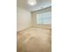 Bedroom with a window and neutral carpet at 1112 Gather Dr, Lawrenceville, GA 30043