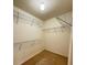 Walk in closet with metal shelving at 1112 Gather Dr, Lawrenceville, GA 30043