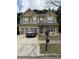 Charming two-story home with neutral siding and a well-maintained front yard at 1112 Gather Dr, Lawrenceville, GA 30043