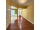 Bright foyer with hardwood floors, view into adjacent living spaces at 1112 Gather Dr, Lawrenceville, GA 30043