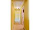 Hallway with carpet flooring, and yellow walls at 1112 Gather Dr, Lawrenceville, GA 30043
