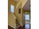 Staircase with natural light. Fresh paint and hardwood floors at 1112 Gather Dr, Lawrenceville, GA 30043