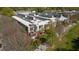An aerial perspective highlights a residence's private outdoor area and proximity to a tree-lined path at 400 Village Ne Pkwy # 203, Atlanta, GA 30306