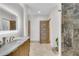 Modern bathroom with marble countertops, sleek vanity, and frameless shower doors for a luxurious feel at 400 Village Ne Pkwy # 203, Atlanta, GA 30306