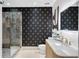 Chic bathroom featuring modern tile, stylish vanity, and a glass-enclosed shower at 400 Village Ne Pkwy # 203, Atlanta, GA 30306
