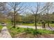 Scenic view of the Beltline trail with lush greenery, walking paths, and community atmosphere at 400 Village Ne Pkwy # 203, Atlanta, GA 30306
