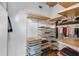 Bright closet design with customizable shelving and rod system for maximum storage versatility at 400 Village Ne Pkwy # 203, Atlanta, GA 30306