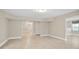Spacious basement area with tile flooring and neutral paint, offering versatile space at 4093 Tritt Homestead Dr, Marietta, GA 30062
