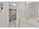 Bright bathroom with a glass-door shower and a sink with white cabinets at 4093 Tritt Homestead Dr, Marietta, GA 30062