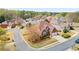 Beautiful two-story brick home with manicured lawn, mature trees, and attached two-car garage in a suburban neighborhood at 4093 Tritt Homestead Dr, Marietta, GA 30062