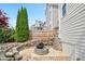 Stone patio and backyard fire pit area, great for entertaining guests at 4093 Tritt Homestead Dr, Marietta, GA 30062