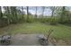 A cozy backyard patio with outdoor seating, providing a relaxing outdoor space at 890 Shiloh Ridge Nw Run, Kennesaw, GA 30144