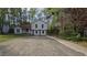 Charming two-story home with a long driveway and well-maintained landscaping at 890 Shiloh Ridge Nw Run, Kennesaw, GA 30144
