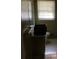 Functional bathroom featuring a vanity, tile flooring, and a window, ready for upgrades and personalization at 1511 Stonewood Dr, Norcross, GA 30093