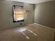 Bedroom with wall-to-wall carpet, blinds, and neutral paint at 1511 Stonewood Dr, Norcross, GA 30093
