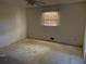 Bedroom with carpet and a window with blinds, offering potential for personalization at 1511 Stonewood Dr, Norcross, GA 30093