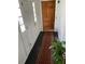 Inviting foyer with traditional doors, red rug runner, and natural light at 1511 Stonewood Dr, Norcross, GA 30093