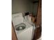 Laundry area featuring a washer and dryer inside of a closet at 1511 Stonewood Dr, Norcross, GA 30093
