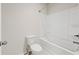 This bathroom features a shower and tub combo, a toilet, and light walls at 4229 Brookmont Way, Auburn, GA 30011