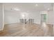 Expansive loft with hardwood floors, featuring recessed lighting, and a view to additional rooms at 4229 Brookmont Way, Auburn, GA 30011