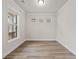 Cozy home office featuring hardwood floors and natural light from large windows at 4229 Brookmont Way, Auburn, GA 30011